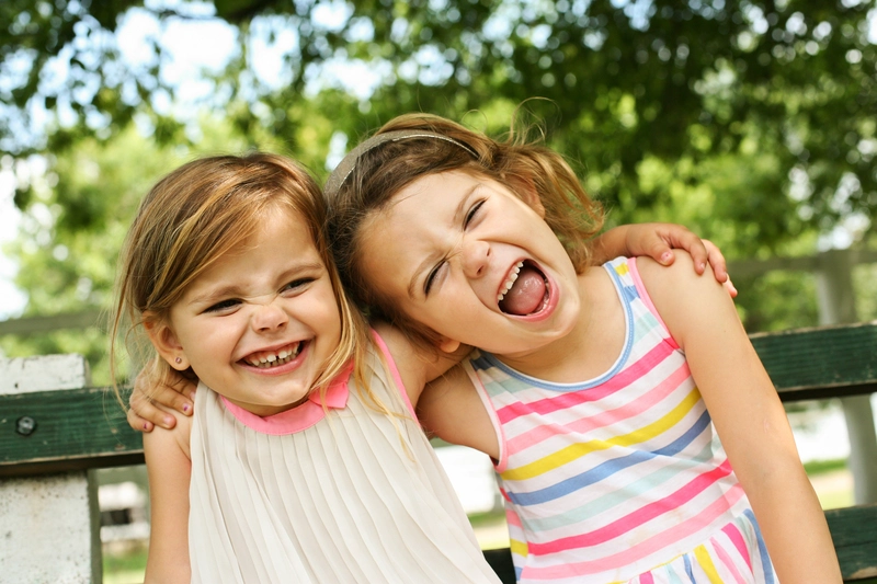 Two Young Girls Very Happy During Summer Time