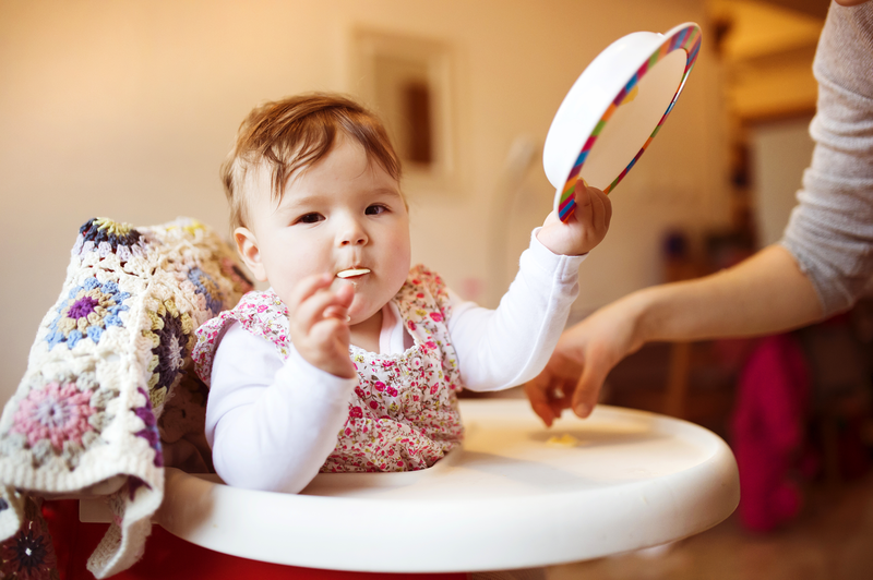 Mother And Daughter Enjoying Breakfast Together SBI 305129573