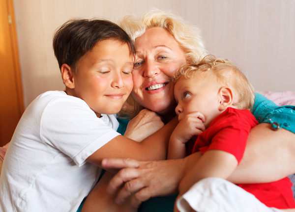 Happy Grandmother Hugging With Her Grandsons Sbi 300931505 (1)